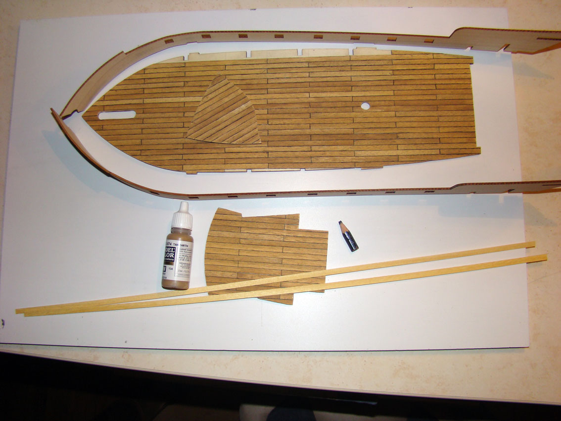 poklady.jpg (168.17 KiB) Przejrzano 11015 razy pomalowane przed kołkowaniem, i wyprofilowane "bulwarks" czy ktoś podpowie polską nazwę?<br />Kiedyś znalazłem, że to bunkry, ale nie bardzo mi pasuje.